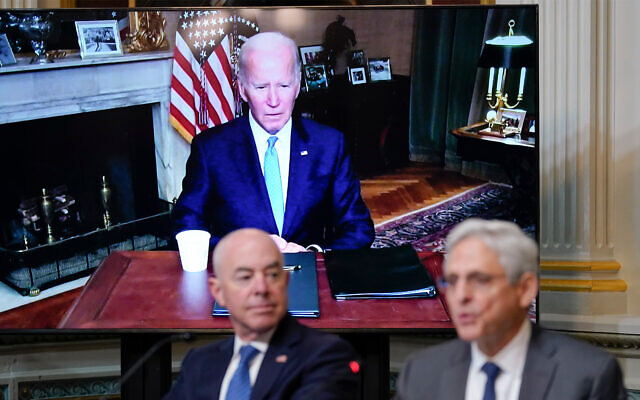 US President Joe Biden listens virtually as Attorney General Merrick Garland, right, speaks during the first meeting of the interagency Task Force on Reproductive Healthcare Access on the White House Campus in Washington, August 3, 2022. Homeland Security Secretary Alejandro Mayorkas looks on. (AP Photo/Susan Walsh) US President Joe Biden listens virtually as Attorney General Merrick Garland, right, speaks during the first meeting of the interagency Task Force on Reproductive Healthcare Access on the White House Campus in Washington, August 3, 2022. Homeland Security Secretary Alejandro Mayorkas looks on. (AP Photo/Susan Walsh)