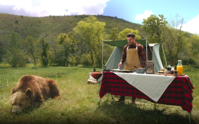 American actor Zac Efron prepares pancakes using Kodiac Cakes mix next to a grizzly bear as part of a promotional video uploaded to his Instagram account on June 14, 2022. (Instagram) American actor Zac Efron prepares pancakes using Kodiac Cakes mix next to a grizzly bear as part of a promotional video uploaded to his Instagram account on June 14, 2022. (Instagram)