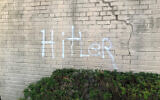 Illustrative: Antisemitic vandalism on the wall of a New York synagogue, August 17, 2022. (Courtesy)