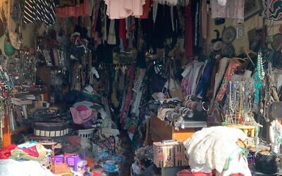 A glimpse through the window of Tel Aviv vintage store Hayo Haya, on Ben Yehuda Street, August 2022 (Danielle Nagler)