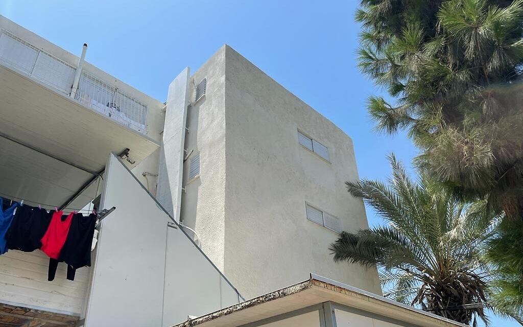 Reconstructed apartment building in Ashkelon, after absorbing a lethal direct hit in 2018, August 7, 2022. (Carrie Keller-Lynn  / The Times of Israel)