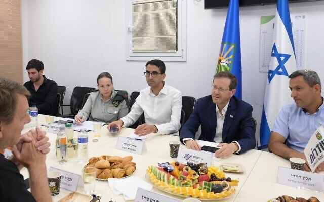 President Isaac Herzog (2nd-R) meets with southern municipal leaders in Sderot on August 8, 2022, the morning after a ceasefire was a reached to end fighting between Israel and the Gaza-based Palestinian Islamic Jihad. (Amos Ben-Gershom/GPO) President Isaac Herzog (2nd-R) meets with southern municipal leaders in Sderot on August 8, 2022, the morning after a ceasefire was a reached to end fighting between Israel and the Gaza-based Palestinian Islamic Jihad. (Amos Ben-Gershom/GPO)