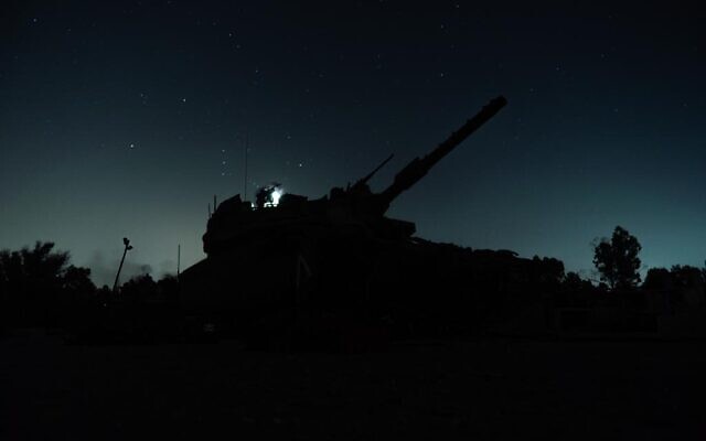 An Israeli tank near the Gaza border during Operation Breaking Dawn, in an image published by the military on August 9, 2022. (Israel Defense Forces) An Israeli tank near the Gaza border during Operation Breaking Dawn, in an image published by the military on August 9, 2022. (Israel Defense Forces)
