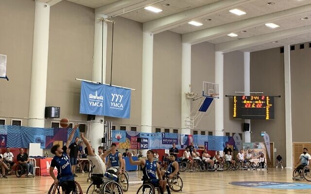 Israeli and US wheelchair basketball teams square off in the final match of the competition at the Jerusalem International YMCA on July 21, 2022. (Charlie Summers/Times of Israel) Israeli and US wheelchair basketball teams square off in the final match of the competition at the Jerusalem International YMCA on July 21, 2022. (Charlie Summers/Times of Israel)