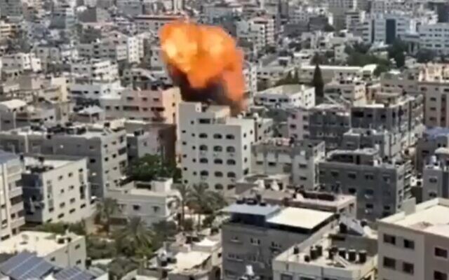 Video said to show the moment an IDF strike hits 5-story building in Gaza Strip after warning for occupants to flee, August 6, 2022 (Screen grab) Video said to show the moment an IDF strike hits 5-story building in Gaza Strip after warning for occupants to flee, August 6, 2022 (Screen grab)