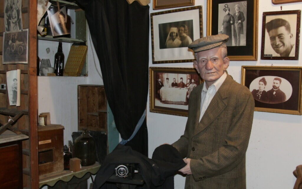 A photographer is part of the lifelike exhibit on Artisans' Way in Rishon Lezion. (Shmuel Bar-Am)