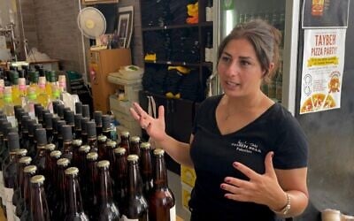 This grab from AFPTV footage shot on September 2, 2022 shows Madees Khoury, head of the Palestinian Taybeh brewery, speaking during an interview with AFP amid the annual Oktoberfest beer festival, east of the West Bank city of Ramallah. (Photo by AFP)