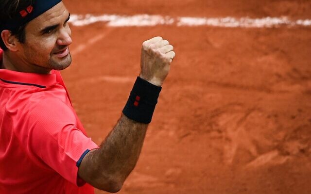 In this file photo from June 3, 2021, Switzerland's Roger Federer celebrates after winning against Croatia's Marin Cilic during their match at the French Open tennis tournament in Paris. (Anne-Christine Poujoulat/AFP) In this file photo from June 3, 2021, Switzerland's Roger Federer celebrates after winning against Croatia's Marin Cilic during their match at the French Open tennis tournament in Paris. (Anne-Christine Poujoulat/AFP)