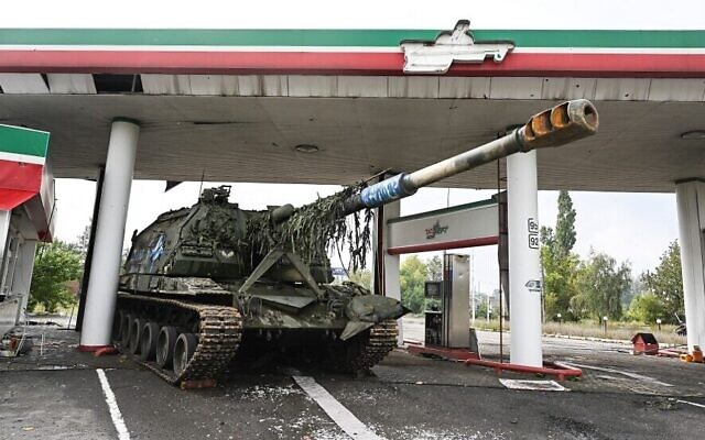 An abandoned Russian tank at a gas station on the outskirts of Izyum, in the Kharkiv region, eastern Ukraine on September 16, 2022, after Ukrainian forces recaptured the eastern city from the Russians. (Juan Barreto/AFP) An abandoned Russian tank at a gas station on the outskirts of Izyum, in the Kharkiv region, eastern Ukraine on September 16, 2022, after Ukrainian forces recaptured the eastern city from the Russians. (Juan Barreto/AFP)
