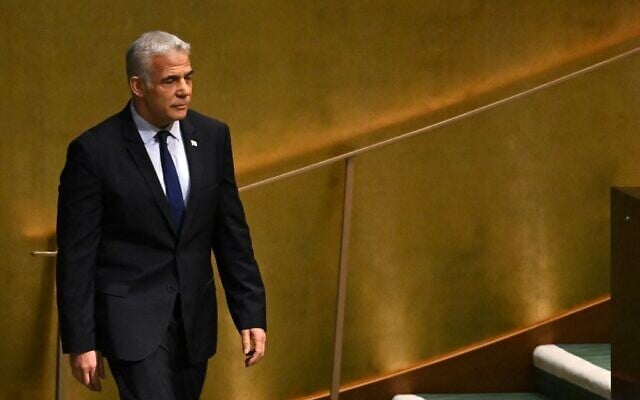 Prime Minister Yair Lapid arrives to speak at the 77th session of the United Nations General Assembly at the UN headquarters in New York City on September 22, 2022. (Timothy A. Clary/AFP)