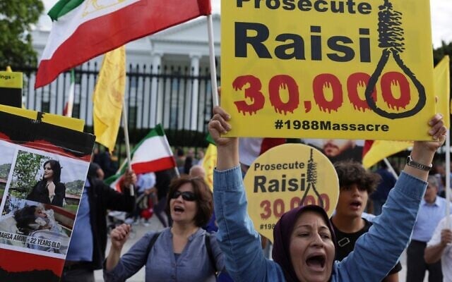 Activists demonstrate over the death of Mahsa Amini in Iran on September 24, 2022, near the White House in Washington, DC. (Alex Wong/Getty Images/AFP) Activists demonstrate over the death of Mahsa Amini in Iran on September 24, 2022, near the White House in Washington, DC. (Alex Wong/Getty Images/AFP)