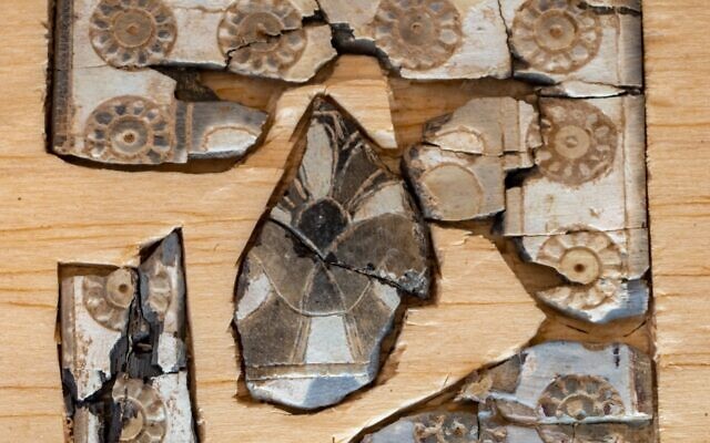 Frame incised with rosettes with a stylized tree in the center. (City of David)