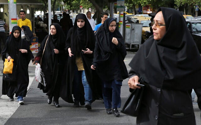 Illustrative: In this Sunday, April 22, 2018, photo, head-to-toe veiled Iranian women cross a street in Tehran, Iran. (AP Photo/Vahid Salemi) Illustrative: In this Sunday, April 22, 2018, photo, head-to-toe veiled Iranian women cross a street in Tehran, Iran. (AP Photo/Vahid Salemi)