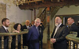 Illustrative: Britain's then-prince Charles and Chief Rabbi Ephraim Mirvis visit the 1736 Suriname reconstructed Tzedek ve-Shalom Synagogue at the Israel Museum in Jerusalem on January 23, 2020. (Menahem Kahana/Pool Photo via AP)