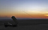 File: This photo released October 12, 2021, by the Iranian Army, shows a missile being fired during a military drill in an undisclosed location in Iran. (Iranian Army via AP)