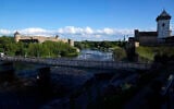 FILE - A bridge straddles Ivangorod, Russia, left, and a border crossing in Narva, Estonia, June 16, 2022. (AP Photo, File)