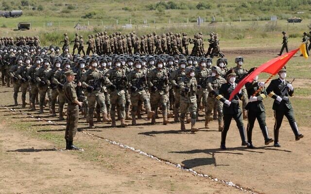 In this photo released by the Russian Defense Ministry Press Service, Chinese troops line up (march) during the Vostok 2022 military exercise at a firing range in Russia's Far East, Aug. 31, 2022. (Vadim Savitsky/Russian Defense Ministry Press Service via AP) In this photo released by the Russian Defense Ministry Press Service, Chinese troops line up (march) during the Vostok 2022 military exercise at a firing range in Russia's Far East, Aug. 31, 2022. (Vadim Savitsky/Russian Defense Ministry Press Service via AP)