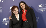 Nan Goldin, left, and director Laura Poitras pose for photographers at the photo call of the film 'All The Beauty and the Bloodshed' during the 79th edition of the Venice Film Festival in Venice, Italy, September 3, 2022. (Photo by Vianney Le Caer/Invision/AP)