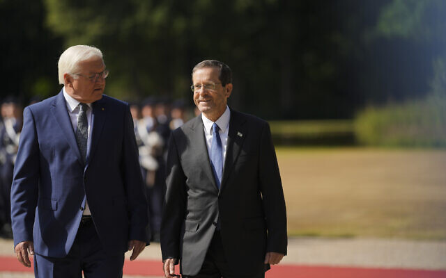 German President Frank-Walter Steinmeier, left, welcomes President Isaac Herzog to Bellevue Palace in Berlin, Germany, September 4, 2022. (AP Photo/Markus Schreiber) German President Frank-Walter Steinmeier, left, welcomes President Isaac Herzog to Bellevue Palace in Berlin, Germany, September 4, 2022. (AP Photo/Markus Schreiber)