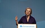 UK Foreign Minister Liz Truss speaks after winning the Conservative Party leadership contest at the Queen Elizabeth II Centre in London, September 5, 2022. (Frank Augstein/AP)