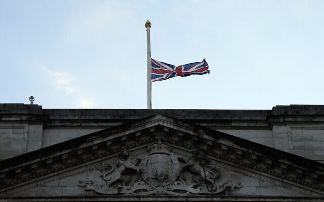 The Union flag on Buckingham Palace in London is lowered after the death of Britain's Queen Elizabeth II, September 8, 2022. (AP Photo/Frank Augstein) The Union flag on Buckingham Palace in London is lowered after the death of Britain's Queen Elizabeth II, September 8, 2022. (AP Photo/Frank Augstein)