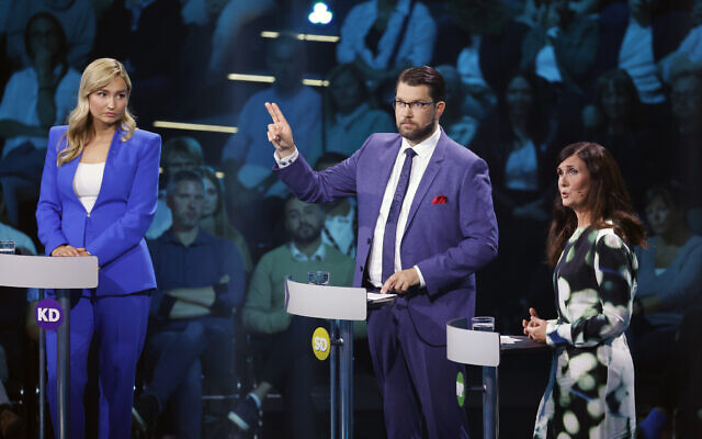 Ebba Busch, leader of the Christian Democrats, left, Jimmie Akesson, leader of the Sweden Democrats and Marta Stenevi, spokesperson for the Green Party, right, take part in a political debate broadcasted on TV4 from Eskilstuna, Sweden, Thursday September 8, 2022. General elections will be held in Sweden on September 11. (Christine Olsson/TT via AP) Ebba Busch, leader of the Christian Democrats, left, Jimmie Akesson, leader of the Sweden Democrats and Marta Stenevi, spokesperson for the Green Party, right, take part in a political debate broadcasted on TV4 from Eskilstuna, Sweden, Thursday September 8, 2022. General elections will be held in Sweden on September 11. (Christine Olsson/TT via AP)