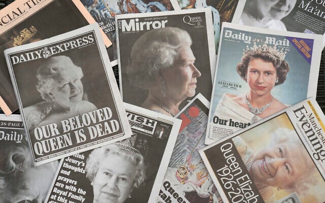 Newspapers devoted to the death of Queen Elizabeth II are seen in Manchester, England, Friday, Sept. 9, 2022. Queen Elizabeth II, Britain's longest-reigning monarch, died on Thursday Sept. 8 aged 96. (AP Photo/Jon Super) Newspapers devoted to the death of Queen Elizabeth II are seen in Manchester, England, Friday, Sept. 9, 2022. Queen Elizabeth II, Britain's longest-reigning monarch, died on Thursday Sept. 8 aged 96. (AP Photo/Jon Super)