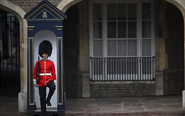 A member of the Coldstream Guards on duty in Friary Court outside of St James's Palace in London, Sept. 10, 2022, before the Accession Council ceremony, where King Charles III is formally proclaimed monarch (Daniel Leal/pool photo via AP)