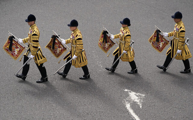 Military personnel in ceremonial uniform arrive for the second Proclamation in the City of London, at the Royal Exchange, as King Charles III is proclaimed King, Sept. 10, 2022 in London (AP Photo/Alberto Pezzali, Pool)