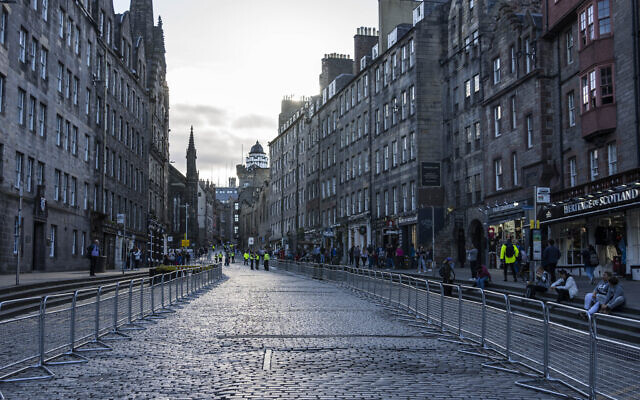 View of the Royal Mile as Edinburgh prepares for thousands of well-wishers to line streets of the city when the Queen's coffin is brought to the Palace of Holyroodhouse, Edinburgh, Scotland, September 10, 2022. (AP Photo/Bernat Armangue) View of the Royal Mile as Edinburgh prepares for thousands of well-wishers to line streets of the city when the Queen's coffin is brought to the Palace of Holyroodhouse, Edinburgh, Scotland, September 10, 2022. (AP Photo/Bernat Armangue)