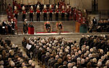 Members of Parliament attend a visit by Britain's King Charles III and Camilla, the queen consort, center, at Westminster Hall, where both Houses of Parliament met to express their condolences following the death of Queen Elizabeth II, in London, September 12, 2022. (John Sibley/ Pool Photo via AP)