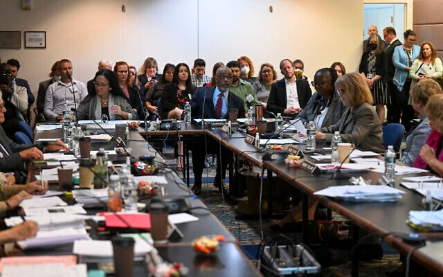 Members of the New York state Board of Regents vote in favor of the P-12 consent agenda including the adoption of revised statewide rules that private schools, including Jewish yeshivas, face stricter enforcement of long-standing requirements that they provide academic instruction 'substantially equivalent' to that in the public sector, Tuesday, Sept. 13, 2022, in Albany, NY (AP/Hans Pennink) Members of the New York state Board of Regents vote in favor of the P-12 consent agenda including the adoption of revised statewide rules that private schools, including Jewish yeshivas, face stricter enforcement of long-standing requirements that they provide academic instruction 'substantially equivalent' to that in the public sector, Tuesday, Sept. 13, 2022, in Albany, NY (AP/Hans Pennink)