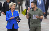 Ukrainian President Volodymyr Zelensky, right, and European Commission President Ursula von der Leyen smile during their meeting in Kyiv, Ukraine, September 15, 2022. (AP Photo/Efrem Lukatsky)