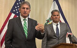 US Sen. Joe Manchin, a West Virginia Democrat, and Competitive Power Ventures CEO Gary Lambert, right, speak at a news conference Friday, September 16, 2022, in Charleston, West Virginia. CPV plans to build a natural gas power plant designed to capture climate-changing carbon in West Virginia. (AP Photo/John Raby)