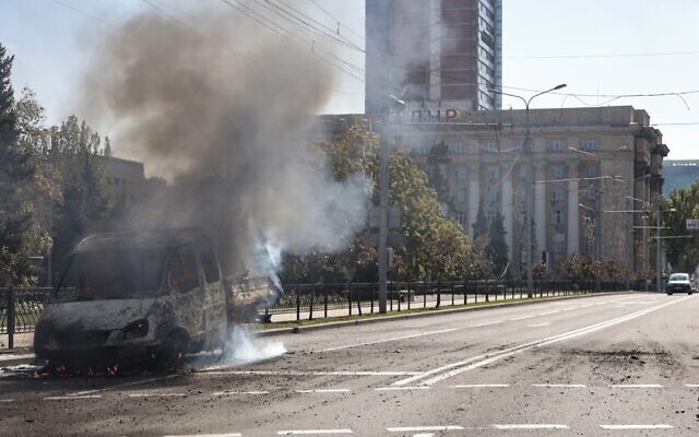 Illustrative: A burning vehicle damaged in shelling is seen in a street in Donetsk, area controlled by Russian-backed separatist forces, eastern Ukraine, Saturday, Sept. 17, 2022.  (AP Photo/Alexei Alexandrov)