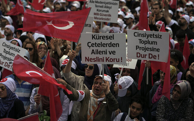 Turkish demonstrators chant slogans while holding Turkish flags and banners during a anti-LGBT protest in the Fatih district of Istanbul, September 18, 2022. (AP Photo/ Khalil Hamra) Turkish demonstrators chant slogans while holding Turkish flags and banners during a anti-LGBT protest in the Fatih district of Istanbul, September 18, 2022. (AP Photo/ Khalil Hamra)