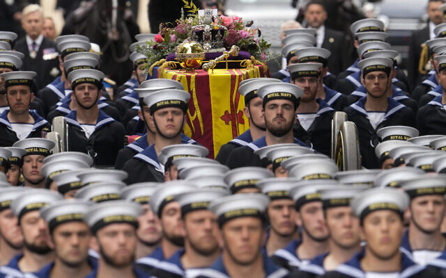 The coffin of Queen Elizabeth II is carried into Westminster Abbey for her funeral in central London, Monday, Sept. 19, 2022. The Queen, who died aged 96 on Sept. 8, will be buried at Windsor alongside her late husband, Prince Philip, who died last year. (AP Photo/Bernat Armangue, Pool) The coffin of Queen Elizabeth II is carried into Westminster Abbey for her funeral in central London, Monday, Sept. 19, 2022. The Queen, who died aged 96 on Sept. 8, will be buried at Windsor alongside her late husband, Prince Philip, who died last year. (AP Photo/Bernat Armangue, Pool)