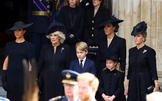Camilla, the Queen Consort, Prince George, Princess Charlotte, Kate, Princess of Wales, Meghan, Duchess of Sussex and Sophie, Countess of Wessex stand after a service at Westminster Abbey on the day of the state funeral and burial of Britain's Queen Elizabeth in London, Monday Sept. 19, 2022. (Hannah Mckay/Pool Photo via AP) Camilla, the Queen Consort, Prince George, Princess Charlotte, Kate, Princess of Wales, Meghan, Duchess of Sussex and Sophie, Countess of Wessex stand after a service at Westminster Abbey on the day of the state funeral and burial of Britain's Queen Elizabeth in London, Monday Sept. 19, 2022. (Hannah Mckay/Pool Photo via AP)