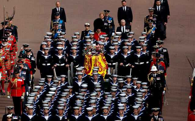 Queen Elizabeth II's funeral cortege borne on the State Gun Carriage of the Royal Navy travels along The Mall in London, Sept. 19, 2022. (Chip Somodevilla/Pool Photo via AP) Queen Elizabeth II's funeral cortege borne on the State Gun Carriage of the Royal Navy travels along The Mall in London, Sept. 19, 2022. (Chip Somodevilla/Pool Photo via AP)