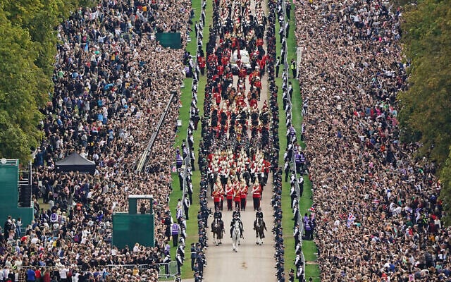 The Ceremonial Procession of the coffin of Queen Elizabeth II travels down the Long Walk as it arrives at Windsor Castle for the Committal Service at St George's Chapel, in Windsor, England, Monday, Sept. 19, 2022. (Aaron Chown/Pool photo via AP) The Ceremonial Procession of the coffin of Queen Elizabeth II travels down the Long Walk as it arrives at Windsor Castle for the Committal Service at St George's Chapel, in Windsor, England, Monday, Sept. 19, 2022. (Aaron Chown/Pool photo via AP)
