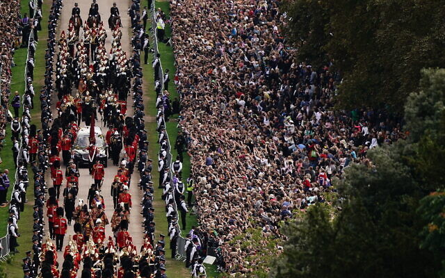 The Ceremonial Procession of the coffin of Queen Elizabeth II travels down the Long Walk as it arrives at Windsor Castle for the Committal Service at St George's Chapel, in Windsor, England, Monday, Sept. 19, 2022. (Aaron Chown/Pool photo via AP) The Ceremonial Procession of the coffin of Queen Elizabeth II travels down the Long Walk as it arrives at Windsor Castle for the Committal Service at St George's Chapel, in Windsor, England, Monday, Sept. 19, 2022. (Aaron Chown/Pool photo via AP)