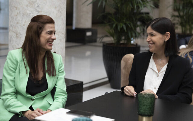 Cyprus Energy Minister Natasa Pilides, left, and Israel's Energy Minister Karine Elharrar, during a meeting in Nicosia, Cyprus, on September 19, 2022. (Stavros Ioannides/ Cyprus Press and Information Office via AP)