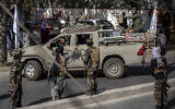 Illustrative: Taliban fighters stand guard at the explosion site, near a mosque, in Kabul, Afghanistan, Friday, Sept. 23, 2022. (AP Photo/Ebrahim Noroozi)