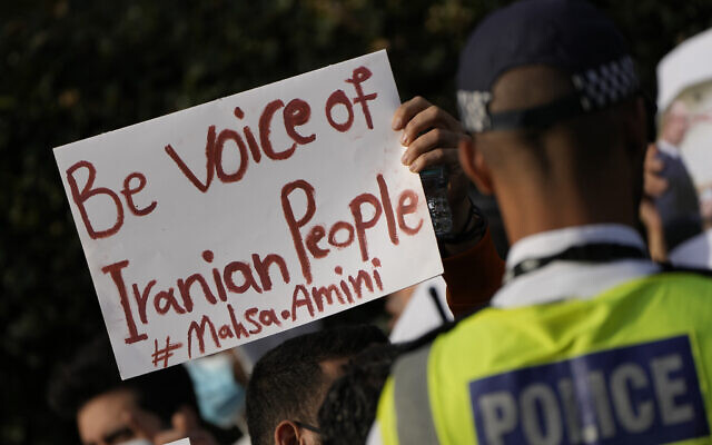 Demonstrators hold placards outside the Iranian Embassy in London, September 25, 2022. (AP Photo/Alastair Grant) Demonstrators hold placards outside the Iranian Embassy in London, September 25, 2022. (AP Photo/Alastair Grant)