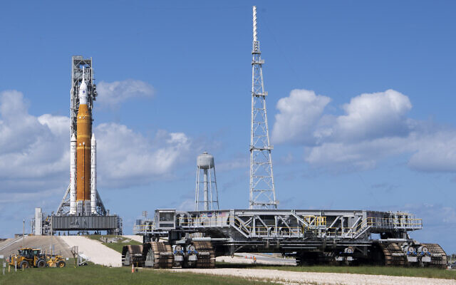 Crawler Transporter-2 outside the gates at Launch Pad 39B as teams configure systems for rolling NASA's moon rocket back to the Vehicle Assembly Building at NASA's Kennedy Space Center in Cape Canaveral, Florida, on September 24, 2022. (Joel Kowsky/NASA via AP)