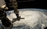 Illustrative: This satellite image provided by NASA on September 26, 2022, shows Hurricane Ian pictured from the International Space Station just south of Cuba gaining strength and heading toward Florida. (NASA via AP)