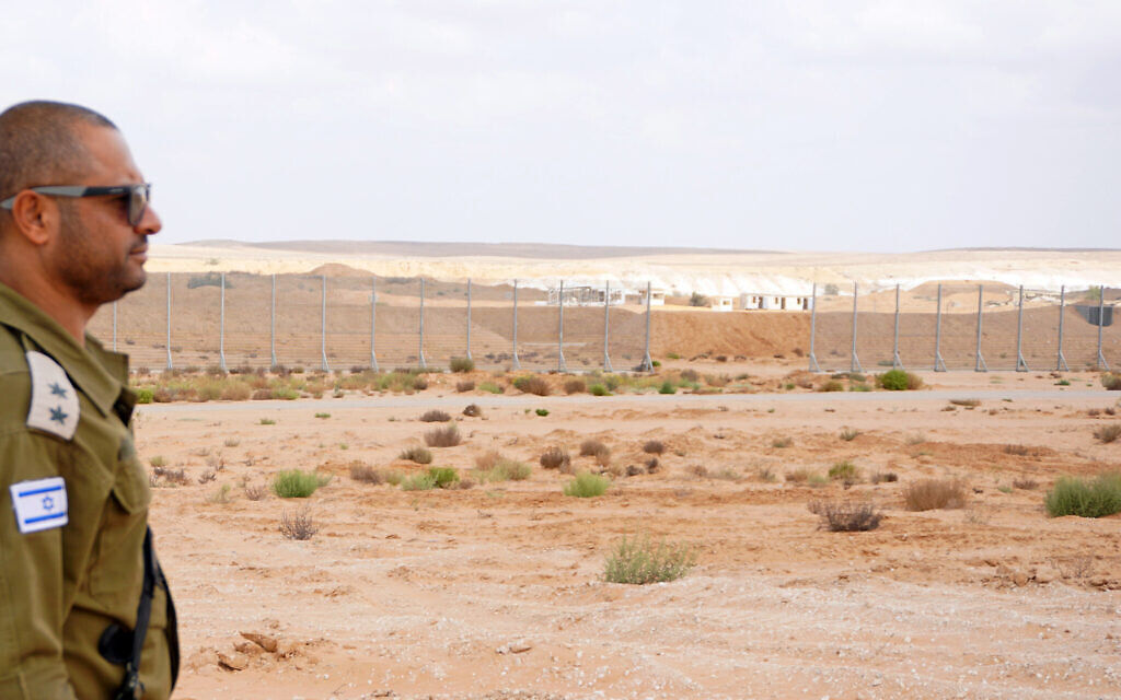 Lt. Col. Itamar Gadir is seen next to a mock Gaza border at the IDF's Southern Command Training Base, September 20, 2022. (Emanuel Fabian/Times of Israel) Lt. Col. Itamar Gadir is seen next to a mock Gaza border at the IDF's Southern Command Training Base, September 20, 2022. (Emanuel Fabian/Times of Israel)