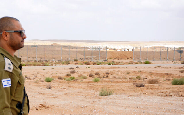 Lt. Col. Itamar Gadir is seen next to a mock Gaza border at the IDF's Southern Command Training Base, September 20, 2022. (Emanuel Fabian/Times of Israel)