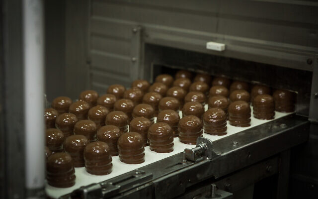 The production line for the sweet snack known as Krembo at the factory in Rehovot on October 27, 2015. (Hadas Parush/Flash90) The production line for the sweet snack known as Krembo at the factory in Rehovot on October 27, 2015. (Hadas Parush/Flash90)