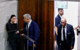 Yair Lapid and Merav Michaeli speak on the sidelines of the Knesset on June 22, 2022. (Olivier Fitoussi/Flash90)